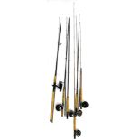 Two split cane fly rods and others, including two Shakespeare fly rods with reels, a Daiwa fly rod w