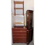 A mahogany corner cabinet, 79cm high, a chest of five long drawers, a two tier hostess trolley, etc.