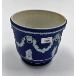 A Wedgwood dark blue jasperware jardiniere, decorated with Neoclassical ladies, etc., 19cm high.