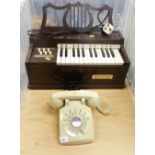 A Steepletone telephone, in cream, and a Rosedale miniature electric chord organ. (2)