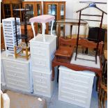 A collection of furniture, to include a pair of three drawer bedside chests, a three tier whatnot, w