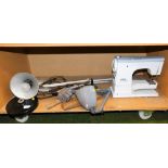 An Elna sewing machine, various Anglepoise type lamps, axe with treen handle, etc. (1 shelf) Buyer N