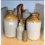 Various stoneware flagons, jars, etc., Soames & Co Ltd Wine & Spirit Merchants Spalding, etc., stone