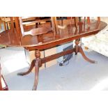 A mahogany extending twin pedestal dining table, the top 89cm x 92cm. Lots 1501 to 1571 are availab