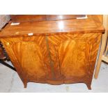 A mahogany television cabinet, 84cm high, 90cm wide, 51cm deep.