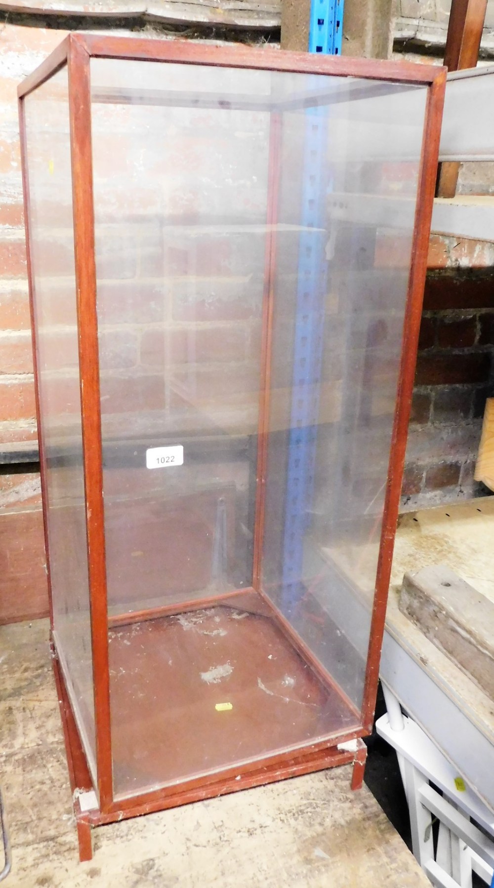 A hardwood framed display case, with four sectional glass panels, 92cm high.