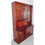 A Clifton Manor mahogany lounge unit, with an arrangement of glazed doors and cabinets, etc., 192cm