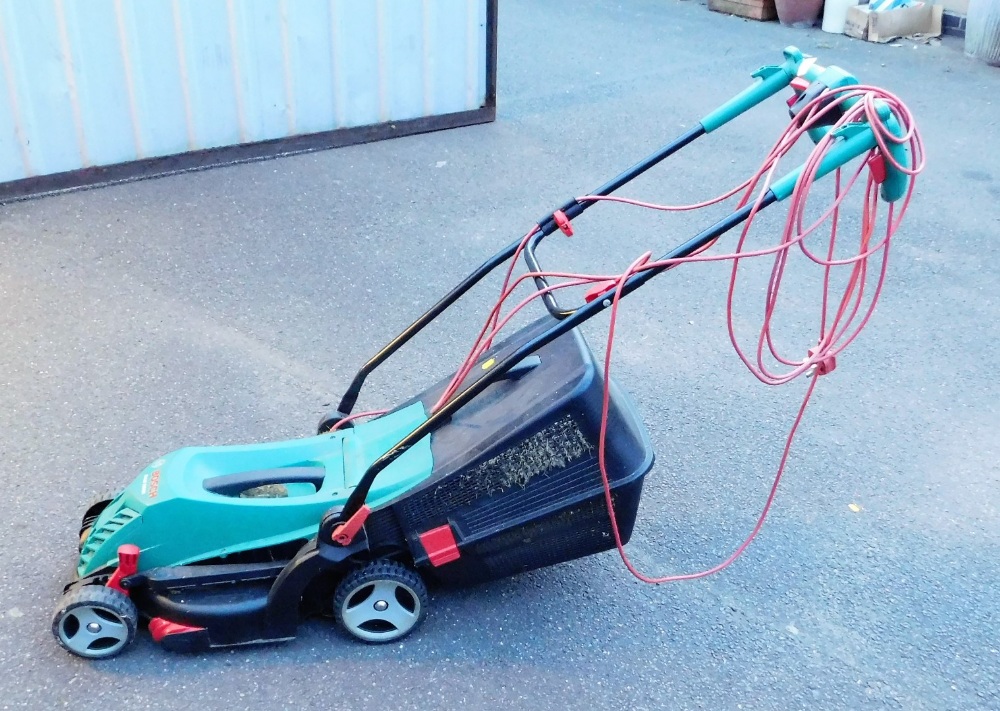 A Bosch Rotak 340ER lawnmower, with grass box. Buyer Note: WARNING! This lot contains untested or un