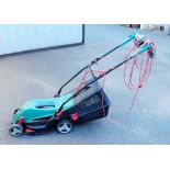 A Bosch Rotak 340ER lawnmower, with grass box. Buyer Note: WARNING! This lot contains untested or un