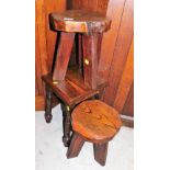 A pair of pitch pine stools, on three stiles, 33cm high, and a similar smaller occasional table.