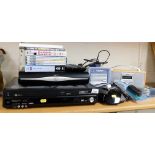 A Panasonic DVD and VHS player, DMR-EZ48V, a Bush radio, Sky HD box, various DVDs, etc. (a quantity)