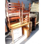 A group of furniture, to include a set of four teak dining chairs, with drop in seats, a kitchen tab