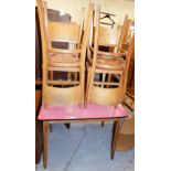 A mid 20thC melamine top kitchen table, and four associated chairs. The upholstery in this lot does