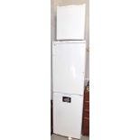 A Hotpoint Iced Diamond fridge freezer, FFAA52, and a Curry's Essentials under counter freezer, CTF3