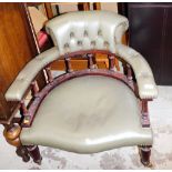 A leatherette club chair, 71cm high.