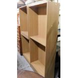 A pair of freestanding open bookcases, 180cm high.