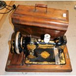 A cased Jones sewing machine.