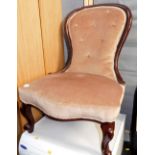 A spoon back nursing chair, 82cm high. Lots 1501 to 1571 are available to view and collect at our a