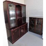 A Morris Furniture Company lounge unit, the top with an arrangement of glazed doors and a central fa