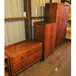 An early 20thC harlequin oak bedroom suite, comprising two door wardrobe and dressing chest, and an