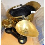 A brass helmet shaped coal scuttle, lacking feet, and a set of brass and cast iron scales. (a quanti