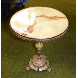 An onyx and gilt metal occasional table, 52cm high.
