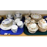 Two late 19thC part tea services, one decorated with bird in blue on a white ground, the other decor