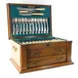A 20thC oak cased canteen of cutlery, containing James Deakin & Sons plated flatware, old English pa