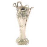 An Art Nouveau silvered metal vase, in the manner of Liberty, the shaped body raised with figures of