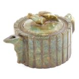 A Chinese carved hardstone teapot, of compressed form, in jade colours, with bamboo decoration and f