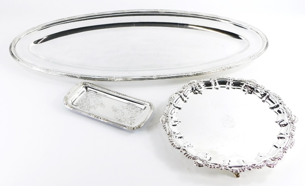 A collection of silver plated ware trays, to include a fish platter, 74cm long, a salver with piecru