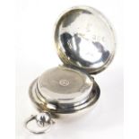 A Victorian silver sovereign case, of circular form, with spring loaded engine turned centre and pla