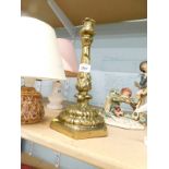 WITHDRAWN PRE SALE BY VENDOR. A late 19th/early 20thC gilt brass candlestick, decorated
