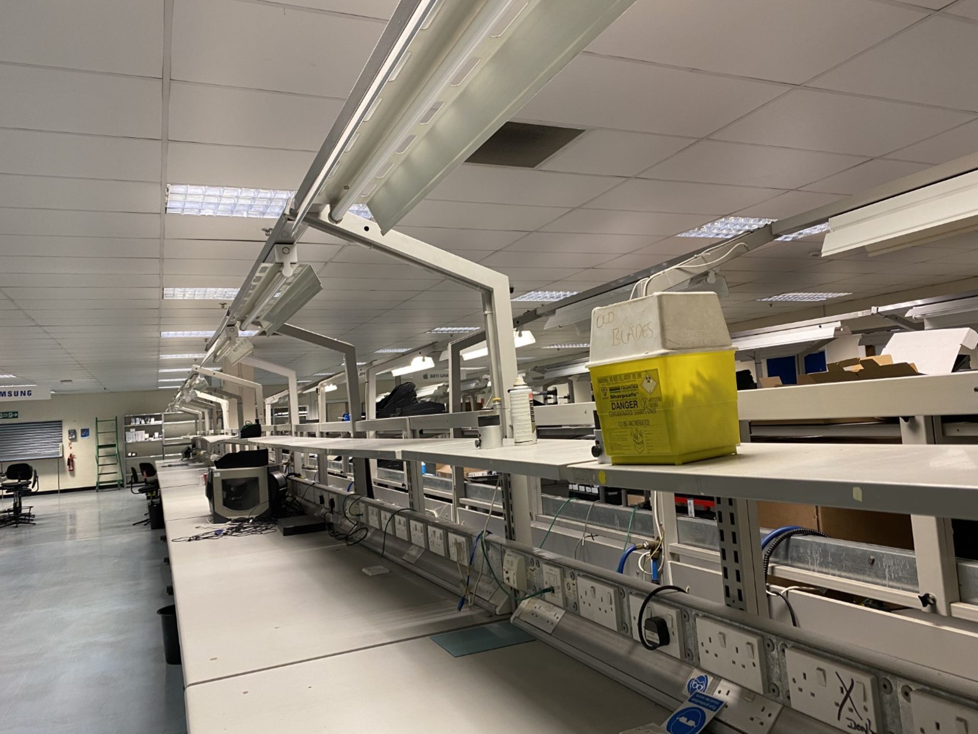 5x Work benches with trunking power sockets, shelving and overhead lighting, grey metal frame - Image 2 of 7