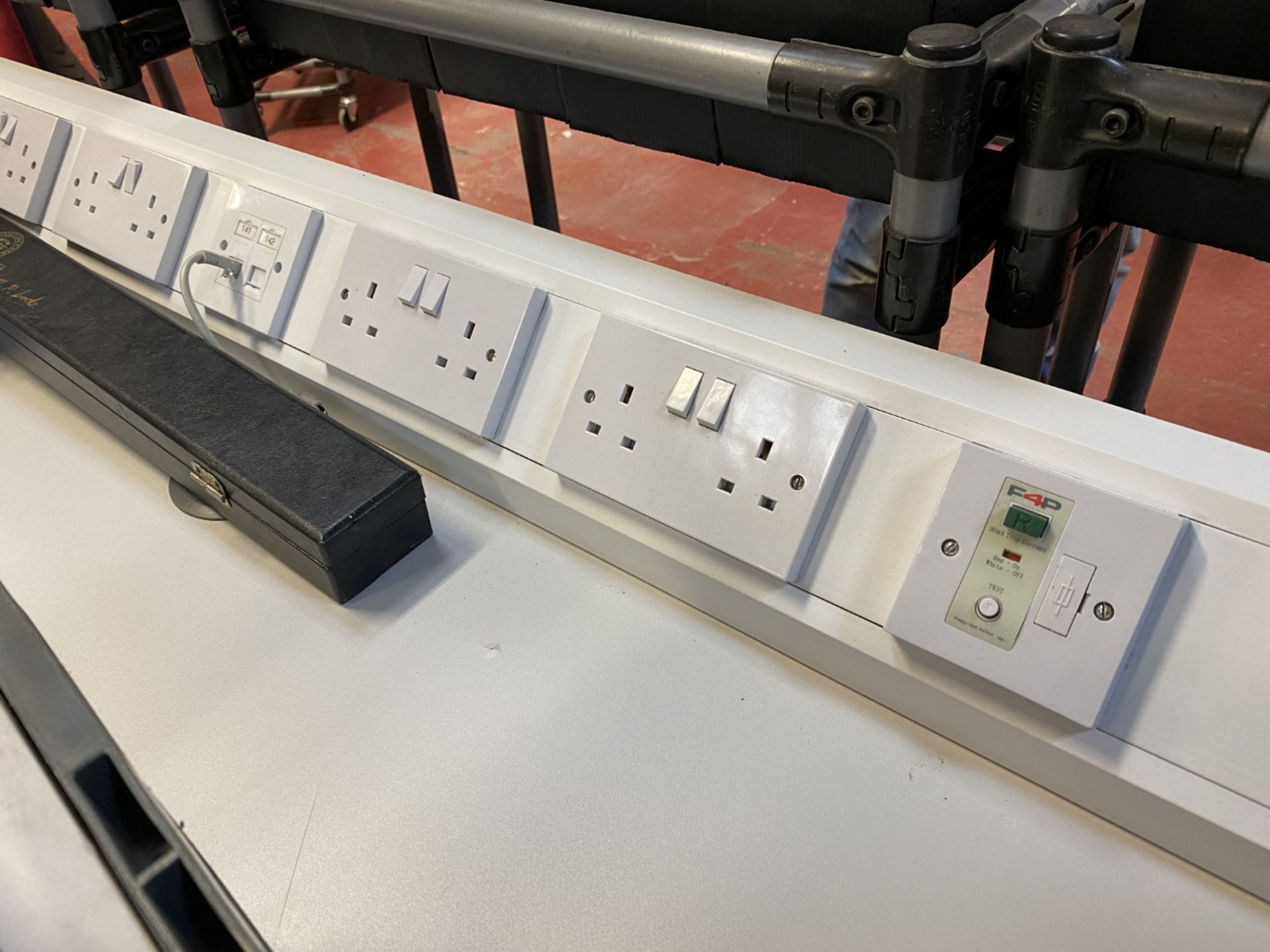 4x Worktop table, red frame, laminate worktop, trunking with sockets, data and RCD protection - Image 2 of 3