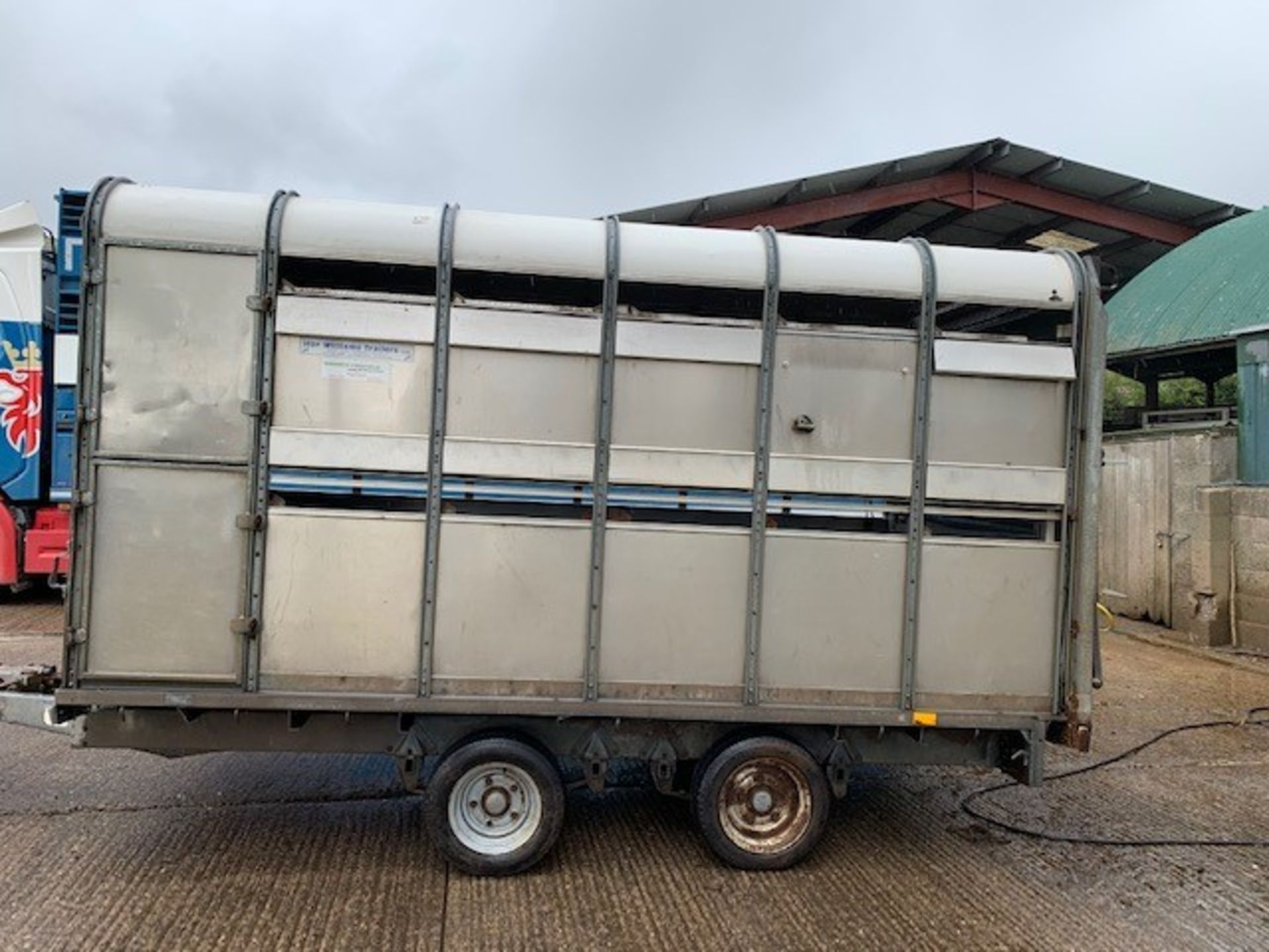 12ft T/A IFOR WILLIAMS LIVESTOCK TRAILER C/W SHEEP DECKS AND DIVIDING GATE FOR CATTLE. by kind