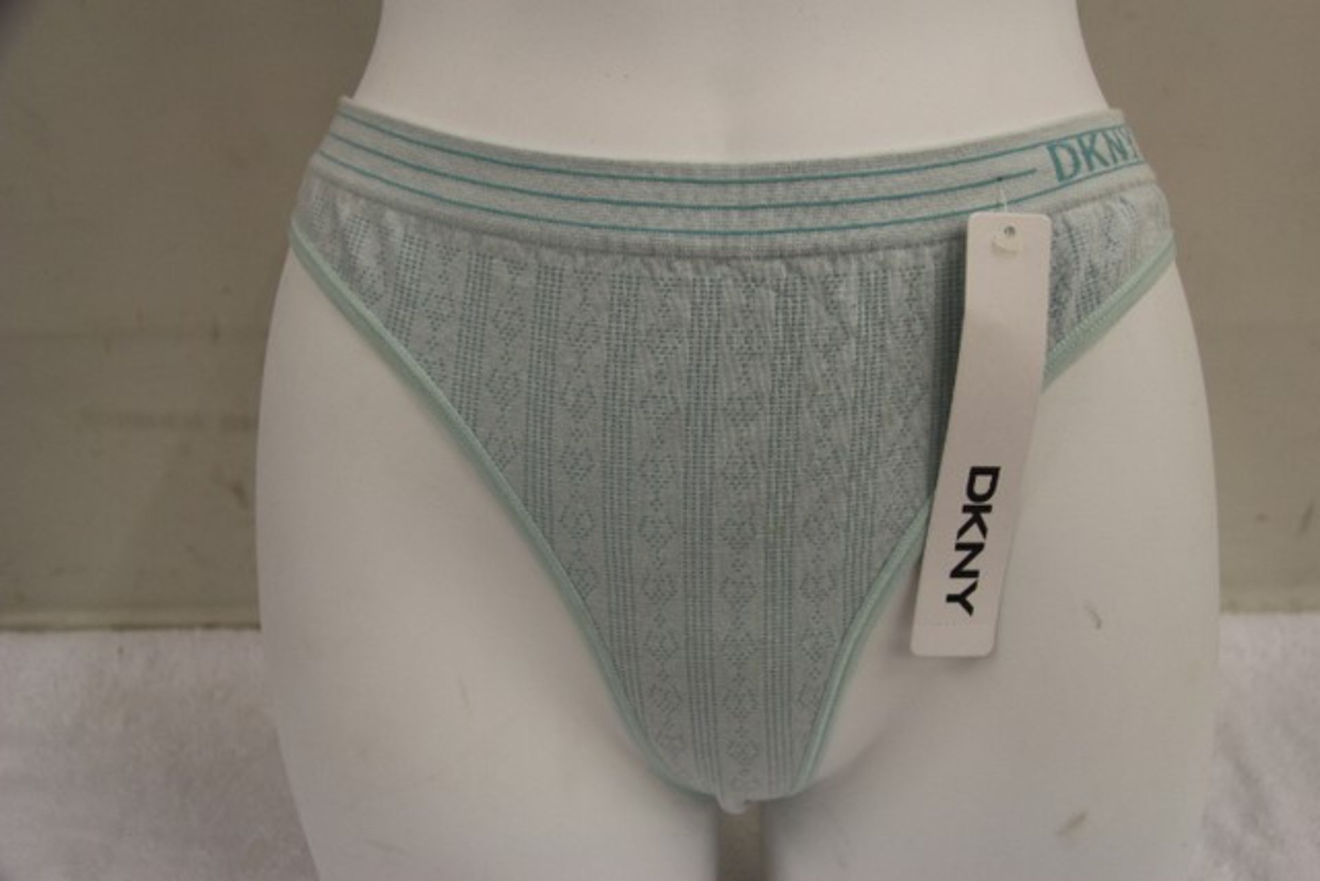 + VAT Brand New Pair Green Pattern DKNY Thongs Size L ISP $18.99 (Walmart)