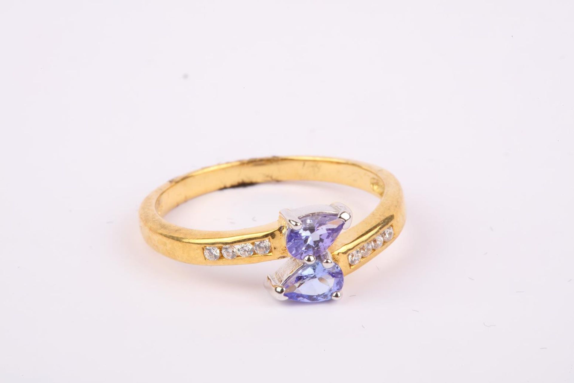 + VAT Brand New Purple Topaz Cross Over Ring