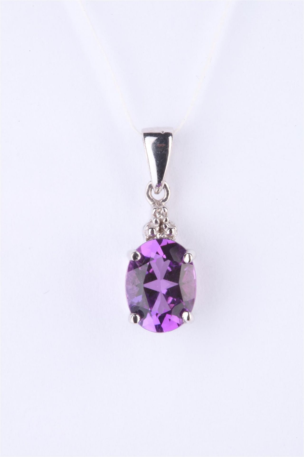 + VAT Ladies Silver Amethyst and Diamond Pendant With Central Oval Amethyst