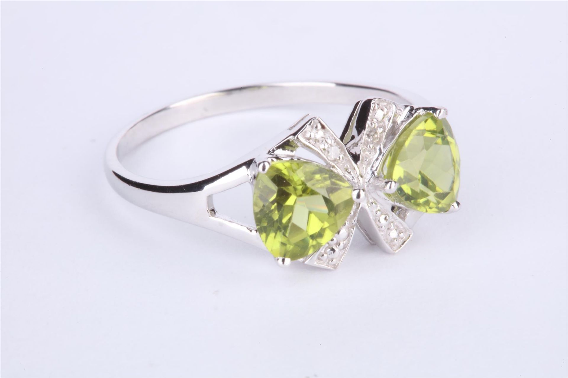 + VAT Ladies Silver Peridot and Diamond Ring In Bow Design