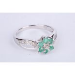 + VAT Ladies Silver Emerald and Diamond Crossover Style Ring Central Mount In Flower Design