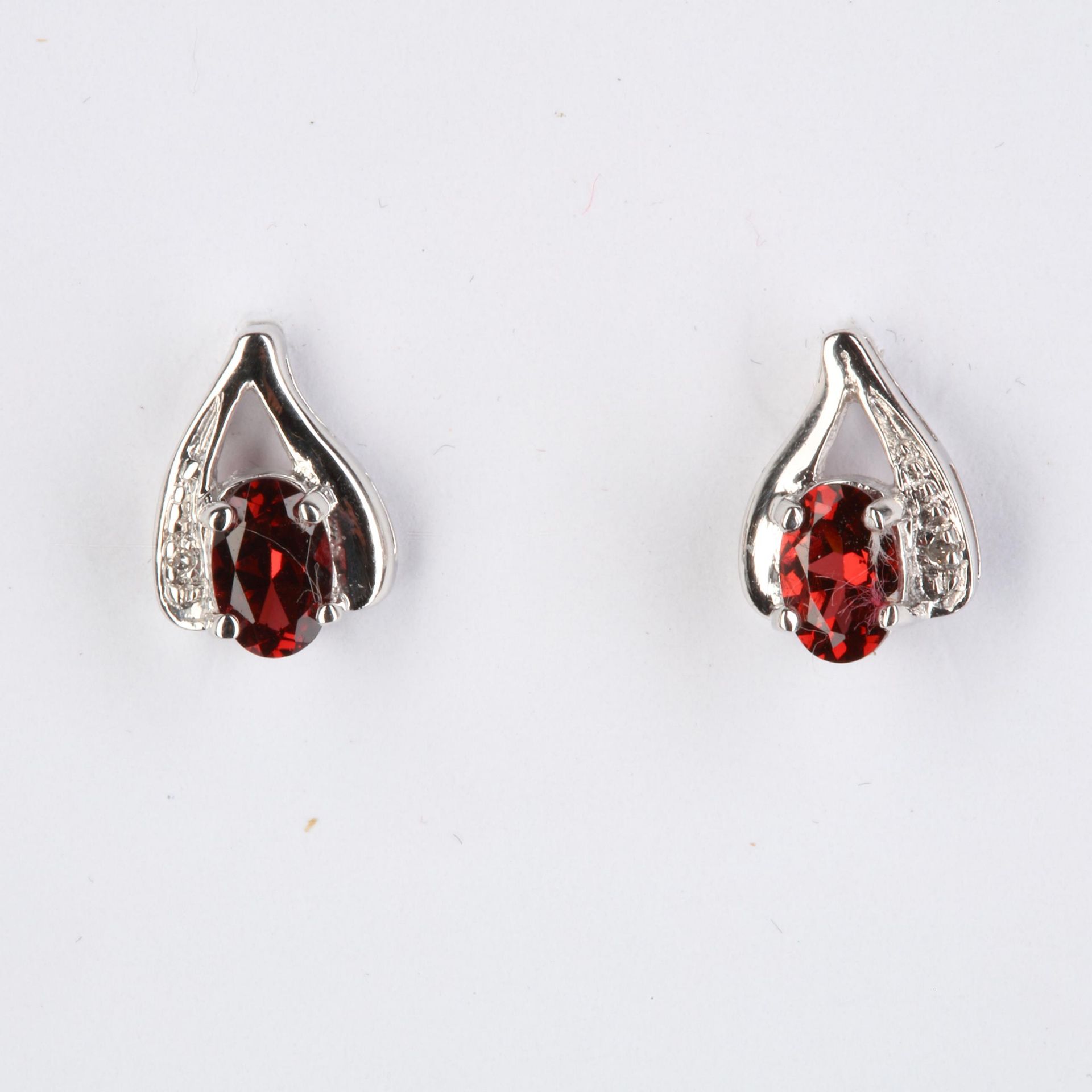 + VAT Pair Ladies Silver Ruby and Diamond Earrings