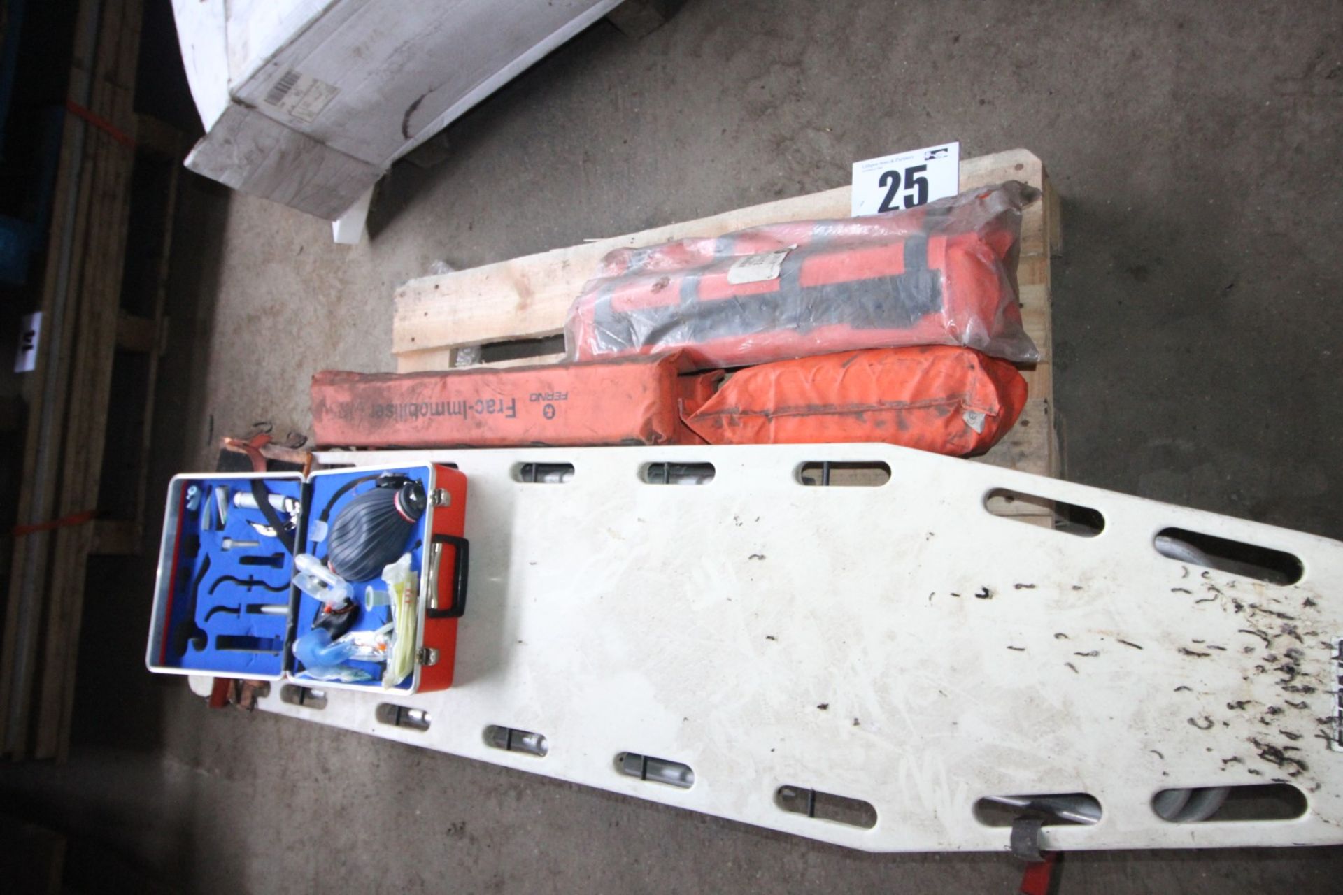 CONTENTS ON PALLET FIRST AID EQUIP. INC. 3 STRETCHERS, LEG AND ARM INFLATABLE IMMOBILIZERS ETC.