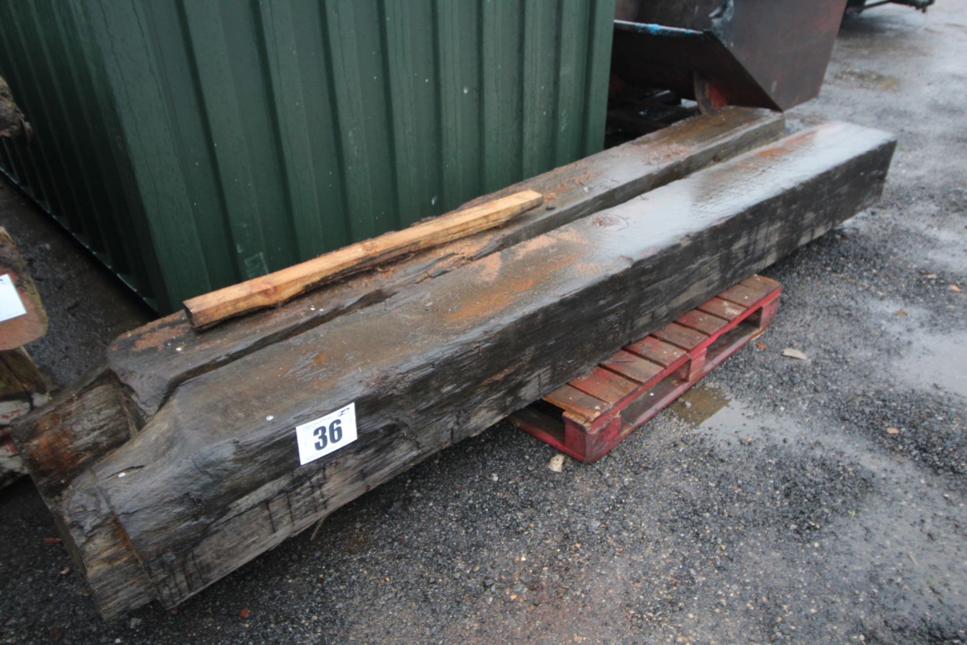2 PITCH PINE HEAVY BEAMS MEASURING APPROX. 140INCH X 13INCH X 13INCH FORKLIFT CHARGE £8