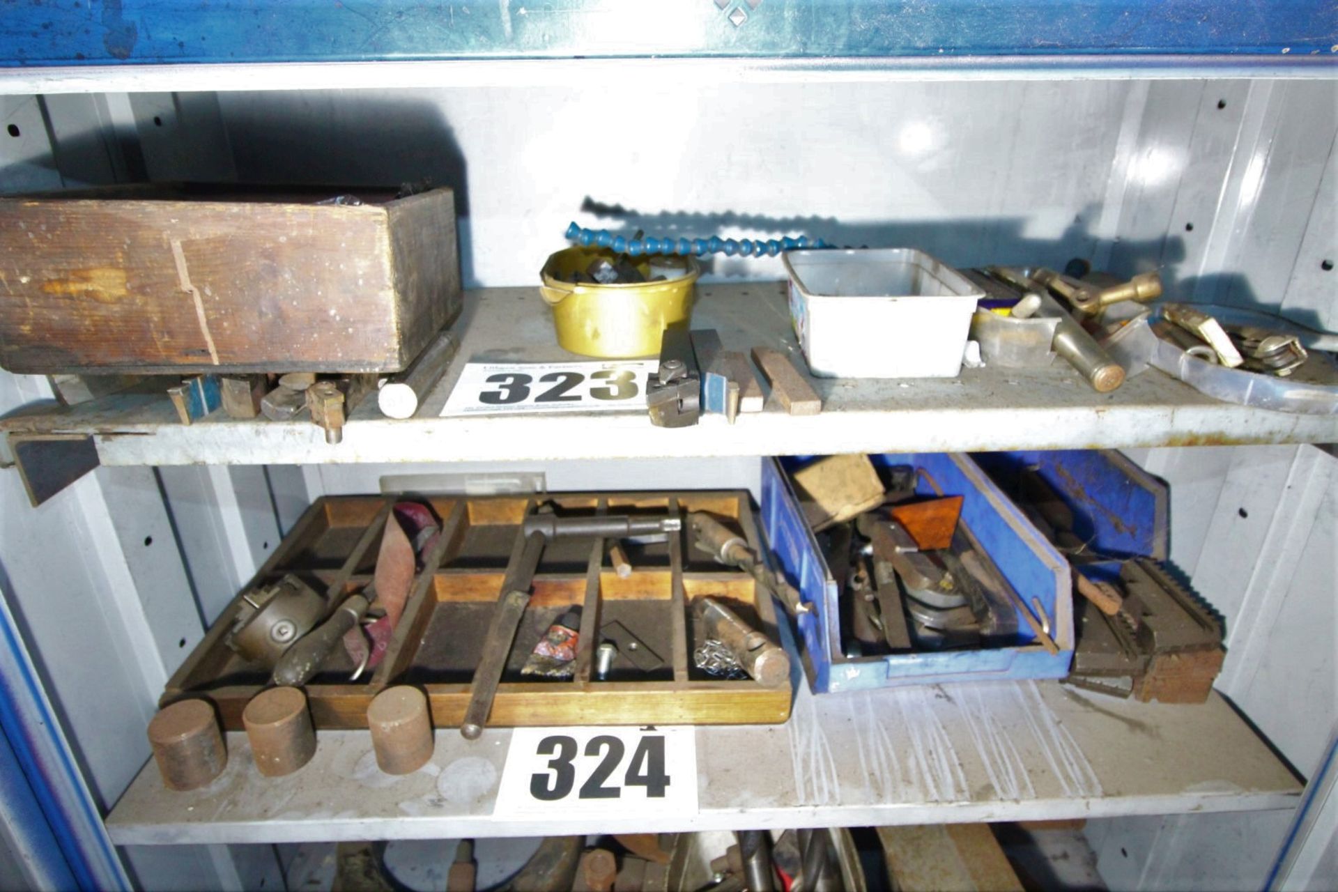 CONTENTS ON TOP SHELF OF CABINET OF LATHE TOOLS