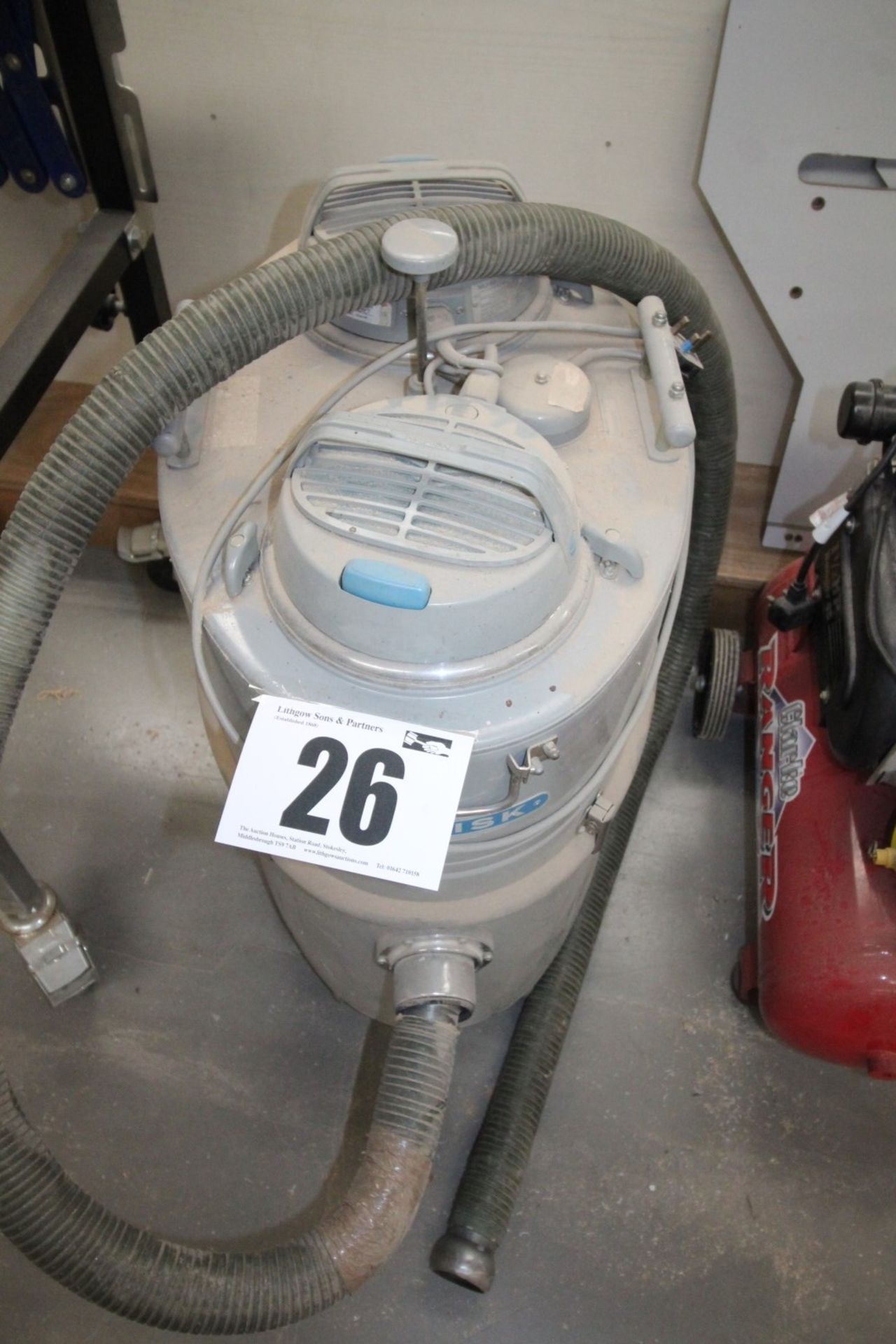 NILFISK 240V COMMERCIAL VACUUM CLEANER (WE ARE INFORMED HAS A FAULT)