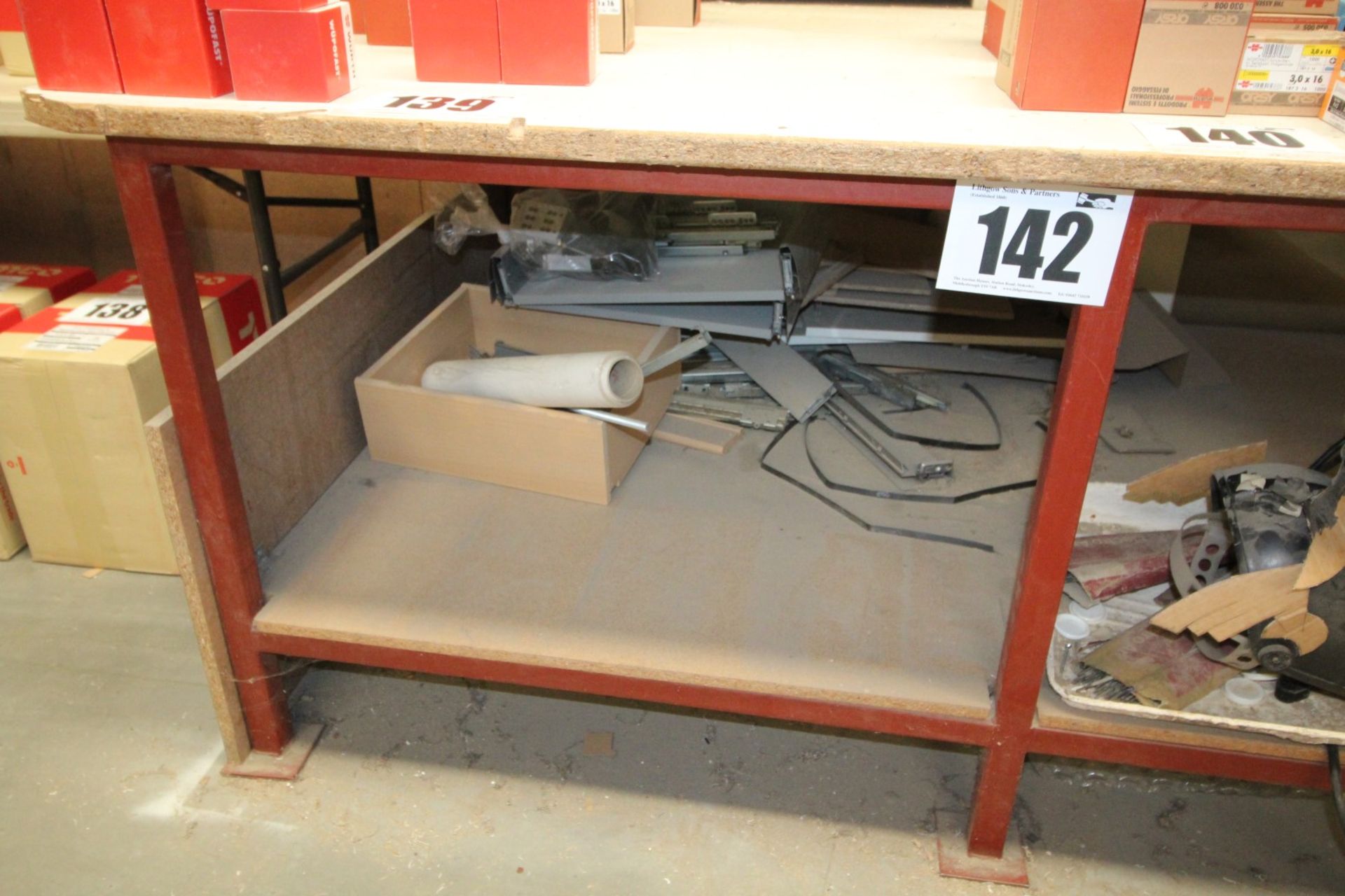 METAL FRAMED, WOODEN TOPPED WORK BENCH MEASURING APPROX. 57INCH x 7FT