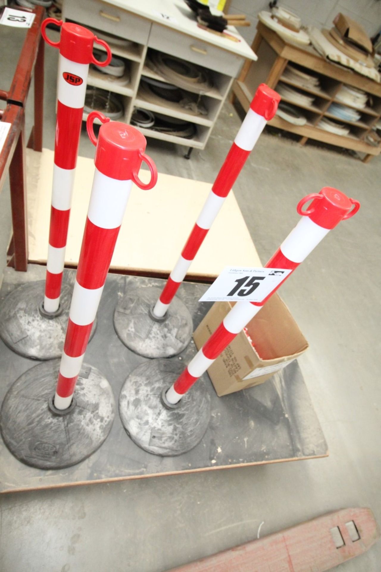 JSP PORTABLE BARRIER SYSTEM COMPRISING 4 RED & WHITE POSTS WITH BASES & QTY OF RED & WHITE PLASTIC