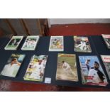 CONTENTS ON TABLE TOP OF 8x PILES OF CRICKETER INTERNATIONAL MAGAZINE INCLUDING 2002, 1973, 1998,