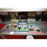 SHELF OF SPORTS BOOKS INCLUDING ENGLISH FOOTBALL, THE MIRROR SECOND BOOK OF FOOTBALL, AND WEMBLEY